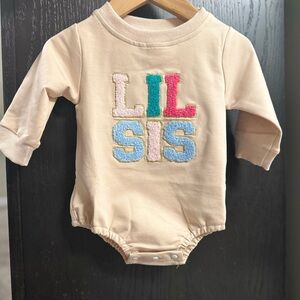Adorable Cream Onesie with Colorful 'Lil Sis' Design